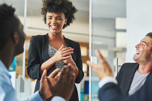 group of workers smiling